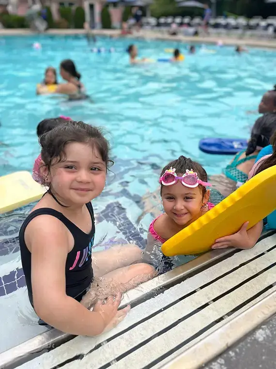 Kids enjoying swimming at The World of Discovery Day Camp in Queens - Blog image: The Benefits of Swimming for Kids.